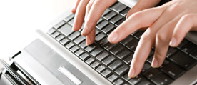 An image pair of hands typing to signify Electronic Notetaking